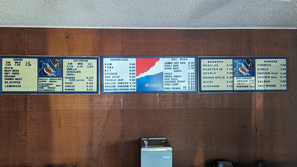 Simple roadside storefront with a retro look.