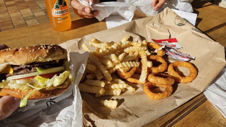 Printed menu showing classic comfort food items.