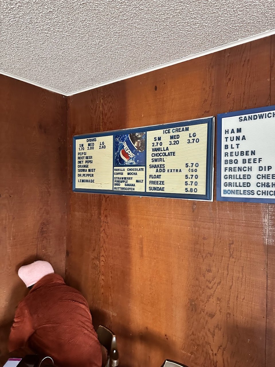 Printed menu showing classic comfort food items.