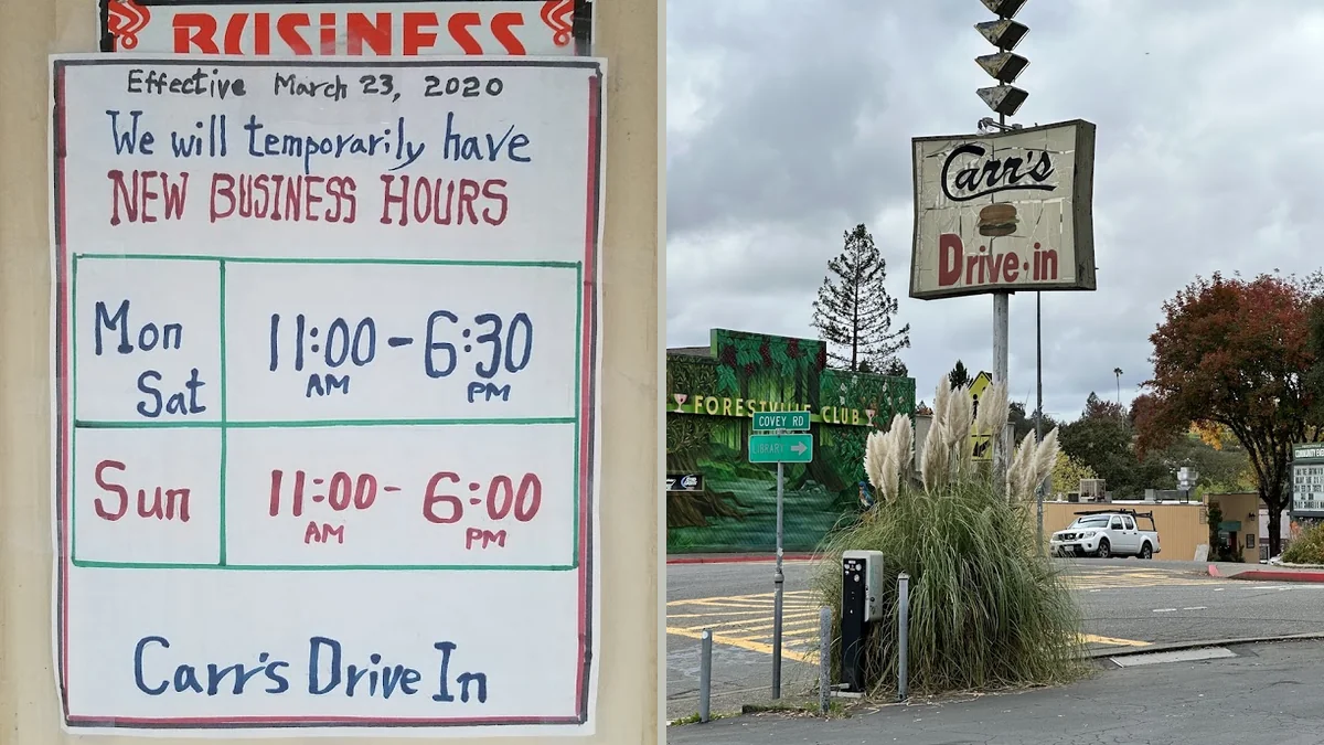 Classic drive-in exterior with parked cars nearby.